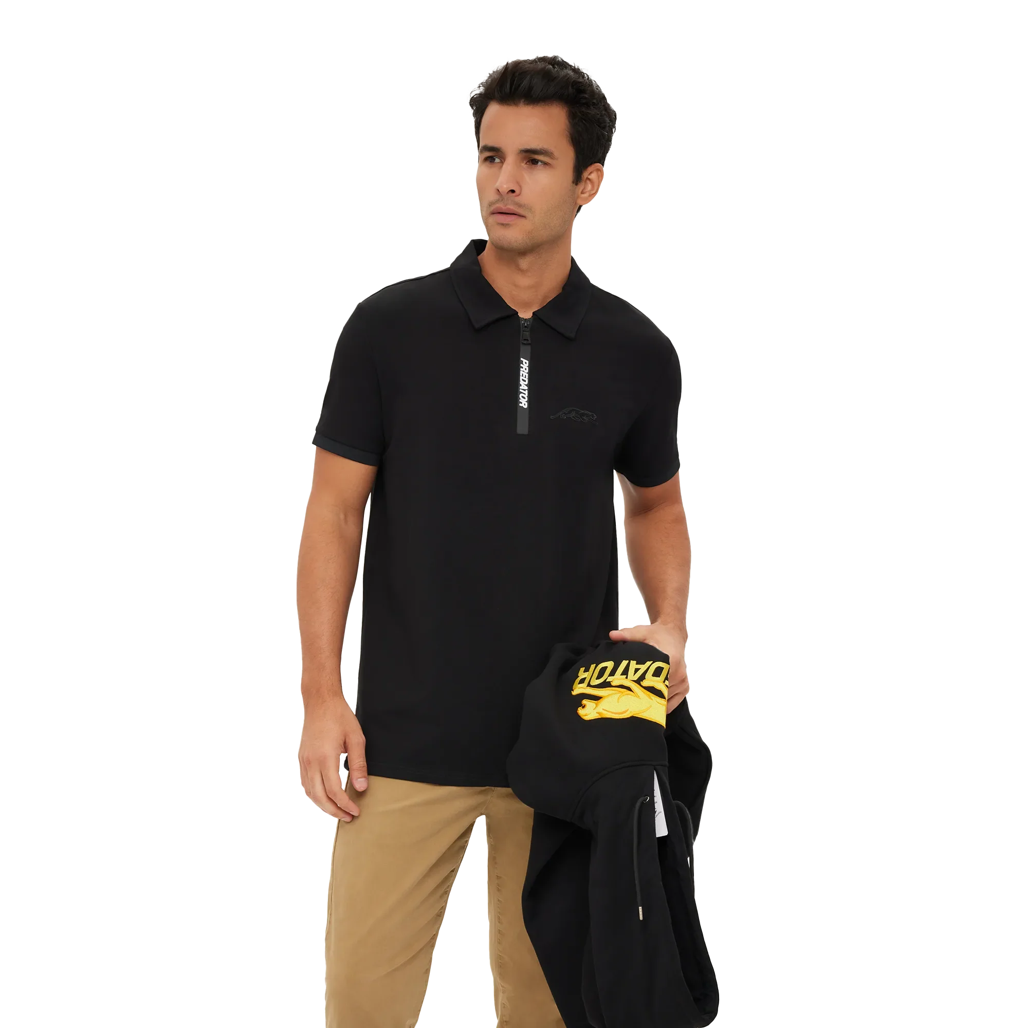Man wearing a black zipper polo shirt with Predator branding
